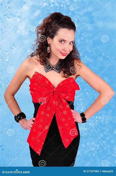 Brunette in a Black Dress with a Big Red Bow Stock Photo - Image of ...