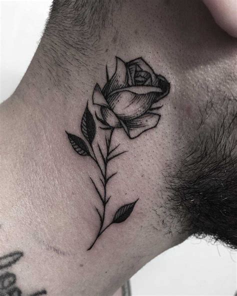 Black rose tattoo on the right side of the neck - Tattoogrid.net