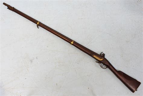 A French pattern 'Charleville' musket, three brass ring 45-inch barrel with ramrod with numerous