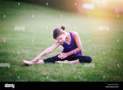 Girl touching her toes hi-res stock photography and images - Alamy