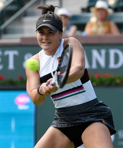 INDIAN WELLS, CA - MARCH 06: Bianca Andreescu of Canada hits a backhand against Irina-Camelia ...