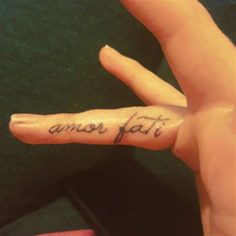 Tattoo 12 "amor fati" - a Latin phrase coined by Nietzsche loosely translating to "love of fate ...