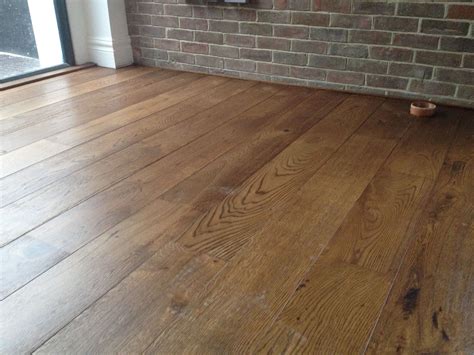 Unfinished brushed oak engineered wood flooring stained dark and then oiled by… | Engineered ...