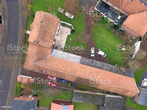 Aerial View Of A Barn A House And A Lawn With A Vertical Downward View ...