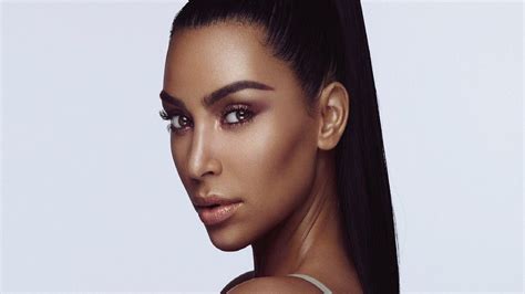 Kim Kardashian faces flak for posting image with 'darkened' skin tone to advertise her makeup ...