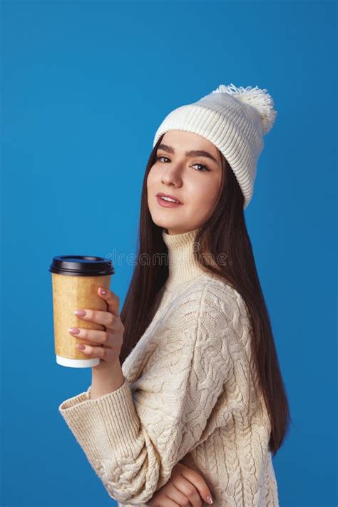 Girl Wearing White Hat and Sweater, Enjoys Drinking Coffee from Takeout Cup Stock Image - Image ...