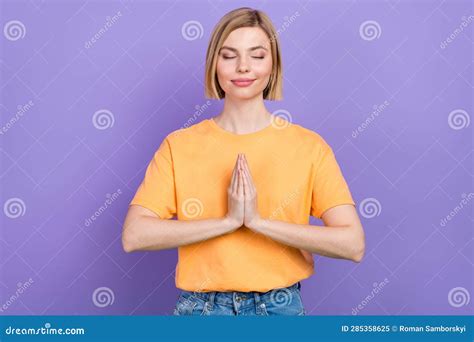 Photo of Relaxed Cute Woman Bob Blonde Hair Wear Yellow T Shirt Hands Together Meditation Peace ...