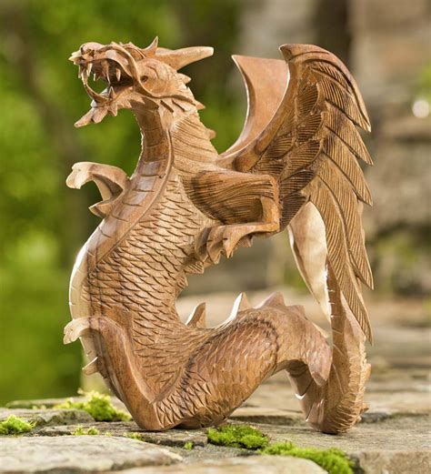 Guaranteed to be a one-of-a-kind piece of art, this Hand-Carved Wooden Dragon will be a ...