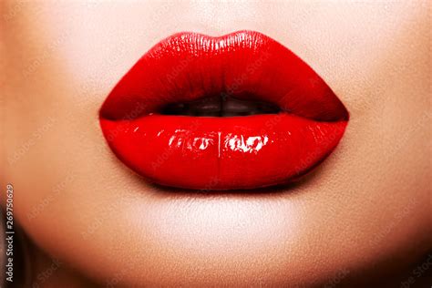 Sexy Red Lips close up. Beautiful Perfect Makeup. Beautiful red Lip Gloss. Cosmetic.mouth open ...