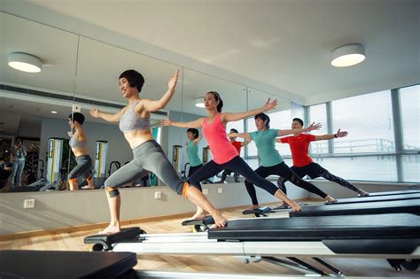 Healthy Women Exercising on Workout Machine - High Quality Free Stock Images