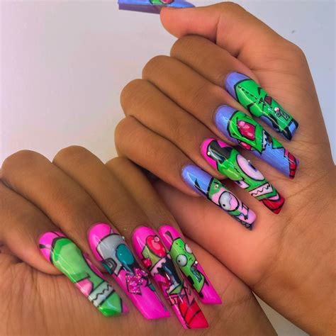 Megan Thee Stallion Showcases Her“Invader Zim” Manicure