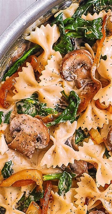 Creamy bow tie pasta with spinach mushrooms and caramelized onions ...