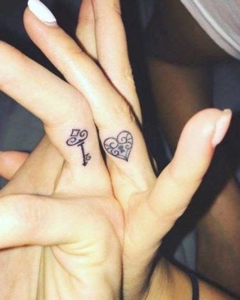 Matching lock and key finger tattoos by Melinda Balogh #matchingtattoos ...