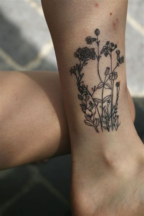 My first! Little flower garden on my left ankle by Reggae at North ...