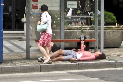 Passed Out Koreans Litter the Streets of Seoul