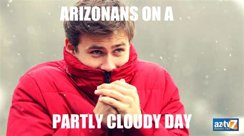 a man in a red jacket with the words arizonans on a party cloudy day