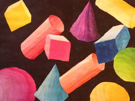 an art project with different colored shapes on black paper