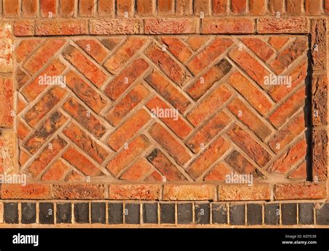 Red Herringbone brick wall seamless background Stock Photo - Alamy