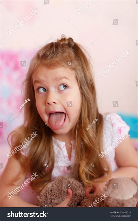 Little Girl Making Funny Face Stock Photo 404923726 | Shutterstock