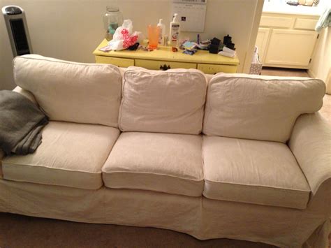 Just scored this Ikea couch with white couch cover for $65! Now to decide what color to dye it ...