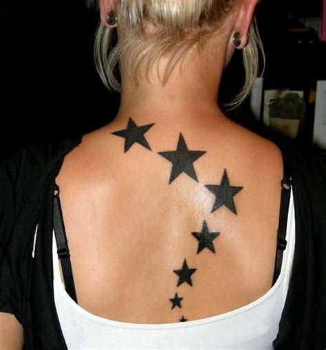 Nice Black Star Tattoos On Girl Upper Back