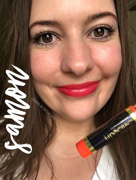 A bright coral lip color that is a perfect lipstick for summer! # ...