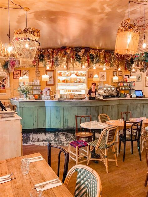 21 of the Cutest Parisian Cafés You Need To Visit - Landry Has Landed Parisian Cafe Interior ...