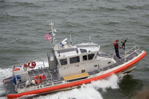 White Orange U.S. Coast Guard Boat on the Sea · Free Stock Photo