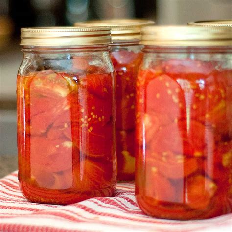 Canning Tomatoes! From cutting them to putting them in the pot to cook to canned in jars. Bushel ...