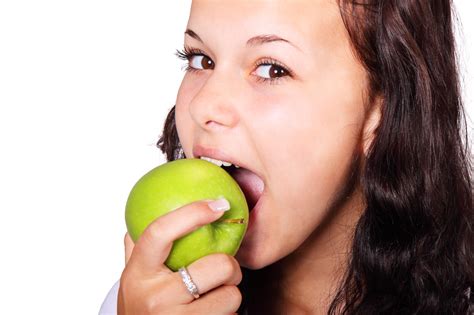 Woman Eating Apple Free Stock Photo - Public Domain Pictures