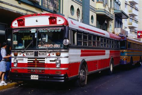 A typical San Jose bus takes on passengers. | San jose costa rica ...