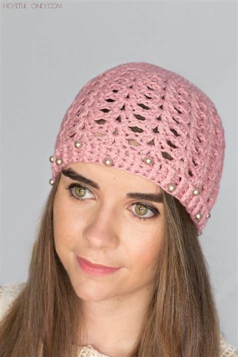 Add some vintage glamour to your wardrobe with this Rosy Pearl hat!This hat was designed with ...