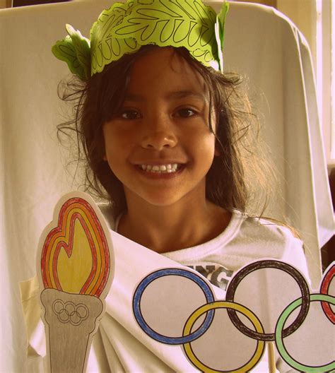 Ancient Greek Olympian "photo booth" pictures with olive branch wreath headpiece, Olympic torch ...