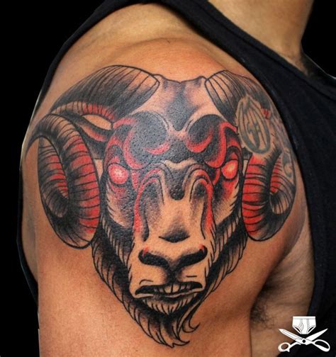 Red ram tattoo on man's shoulder | Ram tattoo, Shoulder tattoo, Tattoos