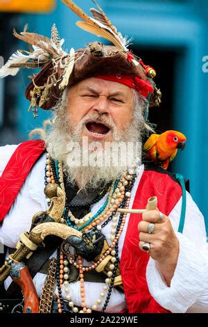 Long John Silver with his parrot on his shoulder Date: First published ...