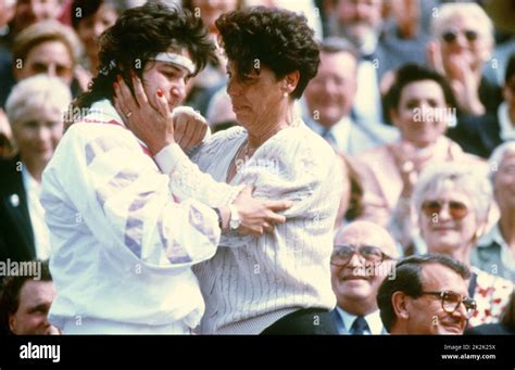 Spanish tennis player Arantxa Sanchez hugging her mother Marisa Sanchez ...