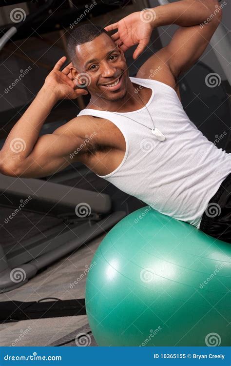 Man doing sit-ups stock image. Image of friendly, athlete - 10365155