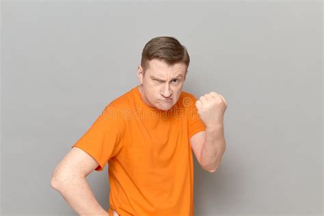 Portrait of Angry Disgruntled Man Shaking Fist in Threatening Gesture Stock Image - Image of ...