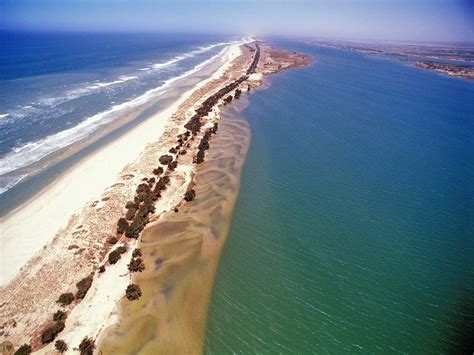 The Barbarie Strip in Saint-Louis, between river and ocean | Africa travel, Secluded beach, Senegal