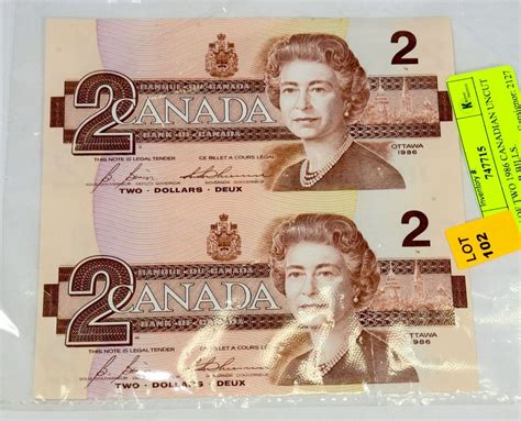 SET OF TWO 1986 CANADIAN UNCUT TWO DOLLAR BILLS.