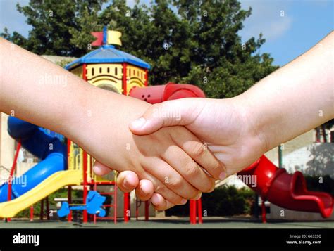 Kids Shaking Hands Stock Photos & Kids Shaking Hands Stock Images - Page 2 - Alamy