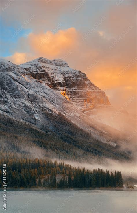 Foggy mountain sunset Stock Photo | Adobe Stock