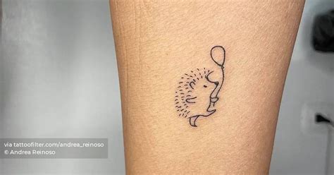 Little hedgehog tattoo located on the ankle.