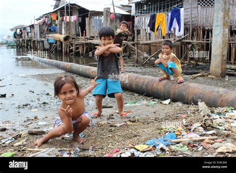 Children of slums posing at Philippines Stock Photo - Alamy