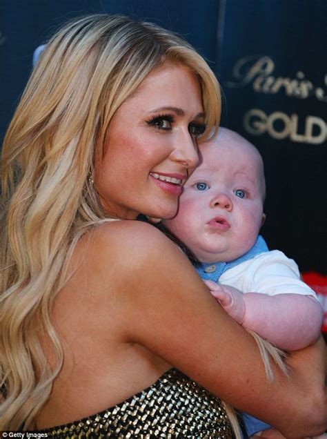 Paris Hilton cradles baby at Melbourne promotional event | Daily Mail ...