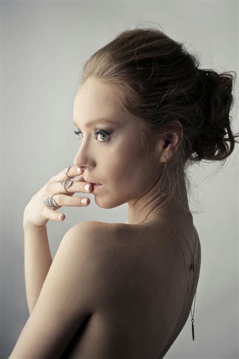 Woman Wearing Silver-colored Earrings Posing · Free Stock Photo