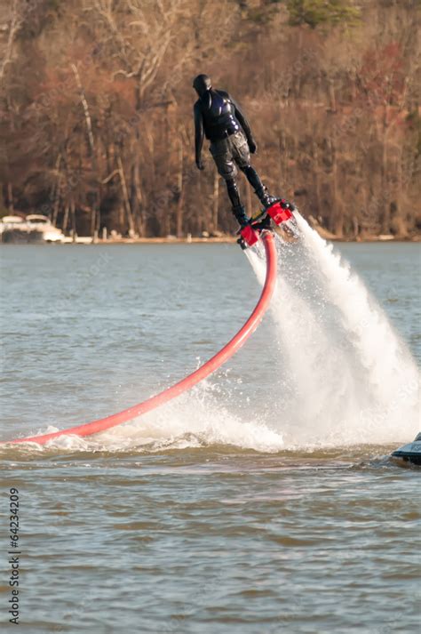 extreme sports of water jetpack flyboarding Stock Photo | Adobe Stock