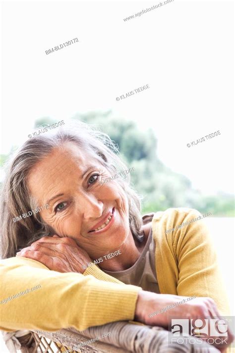 Woman smiling outdoors, Stock Photo, Picture And Royalty Free Image ...