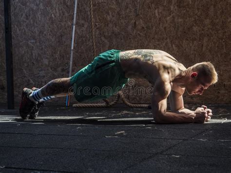 Young Man in Gym Doing Exercises for Abs. Stock Photo - Image of body, healthy: 137100438