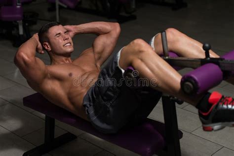 Healthy Man Doing Sit-Ups in Gym Stock Image - Image of fitness, adult: 79825855